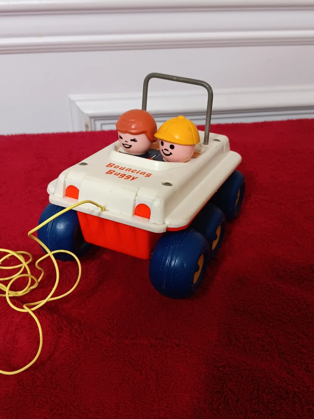 Vintage 1973 Fisher-Price Bouncing Buggy Pull Toy - White, Red & Blue